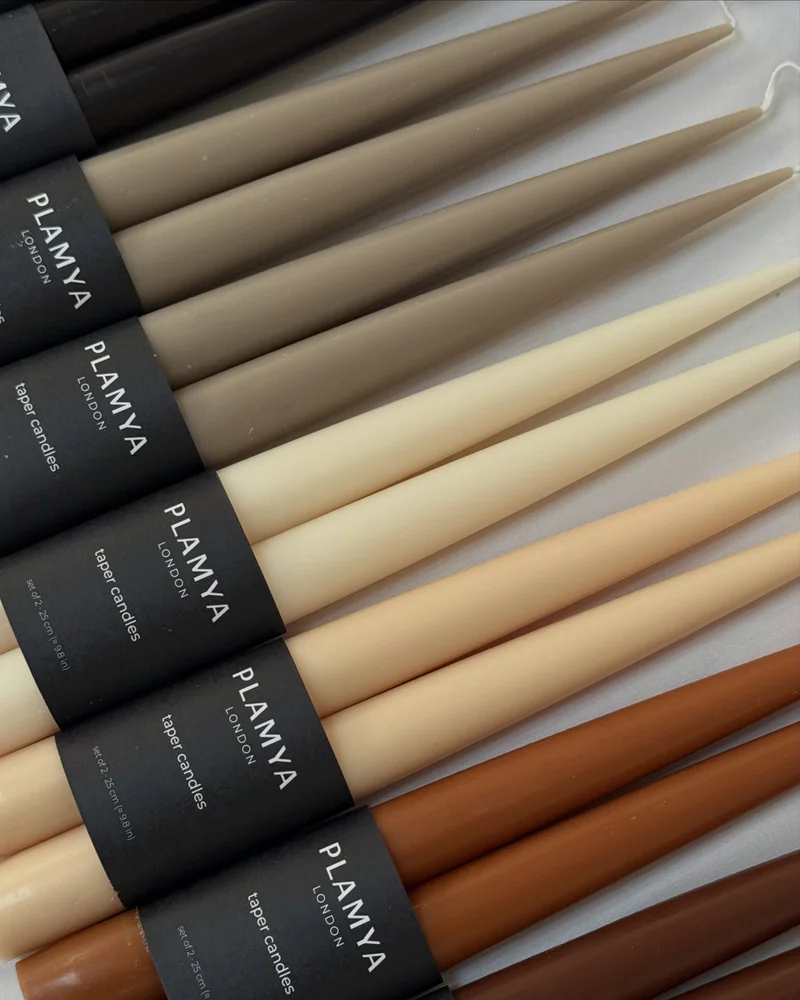 Sculptural candles arranged as a contemporary decorative object.