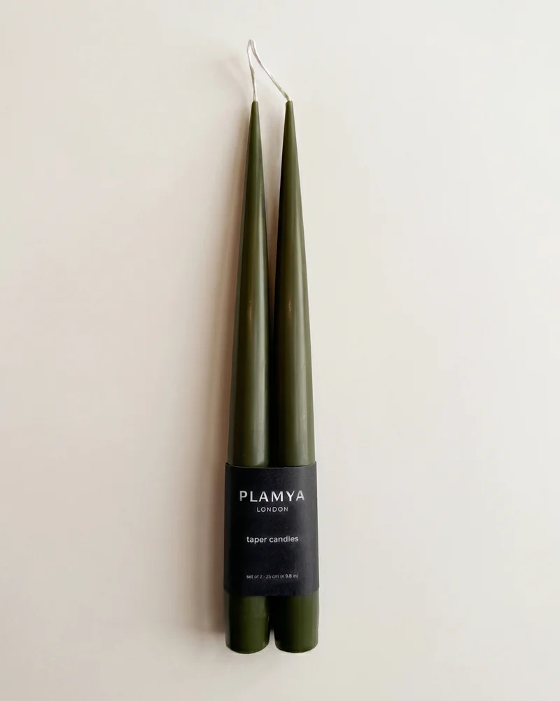Deep Pine taper candle pair wrapped with a PLAMYA paper band