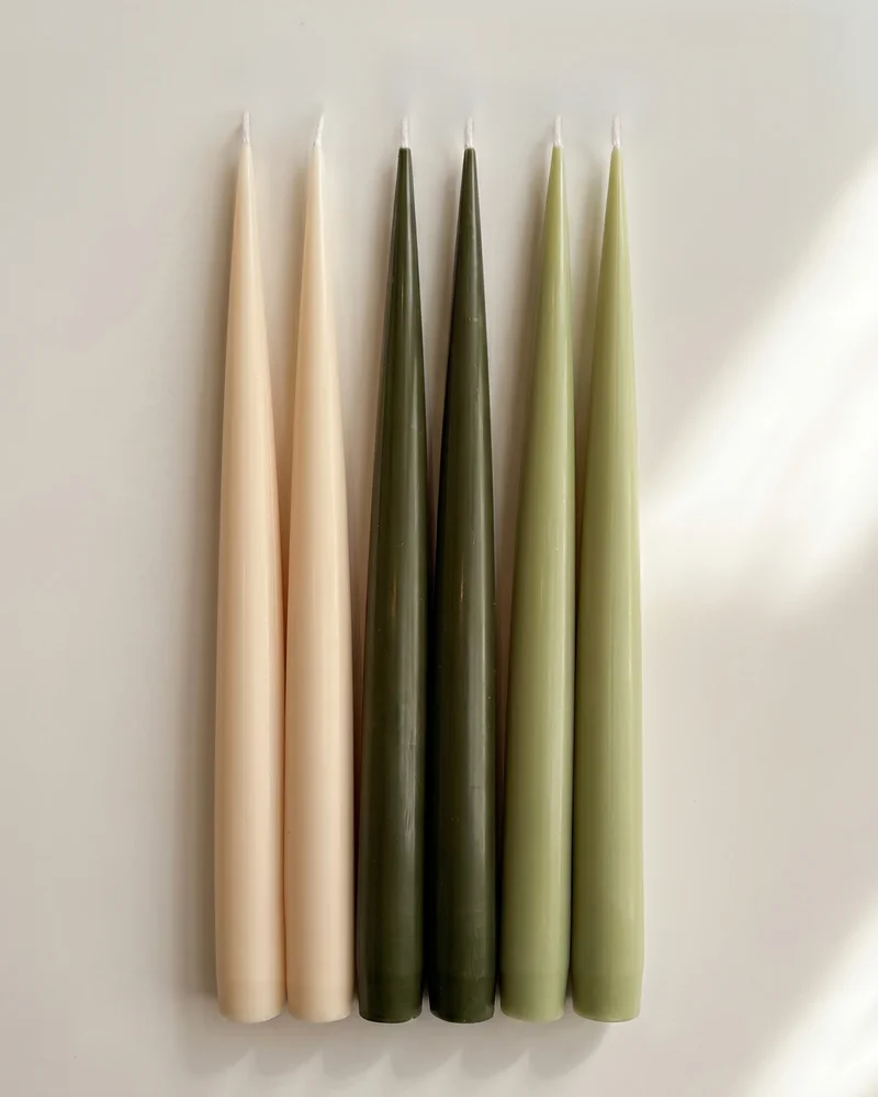Forest Six taper candles arranged in pairs of ivory, deep green and pale green