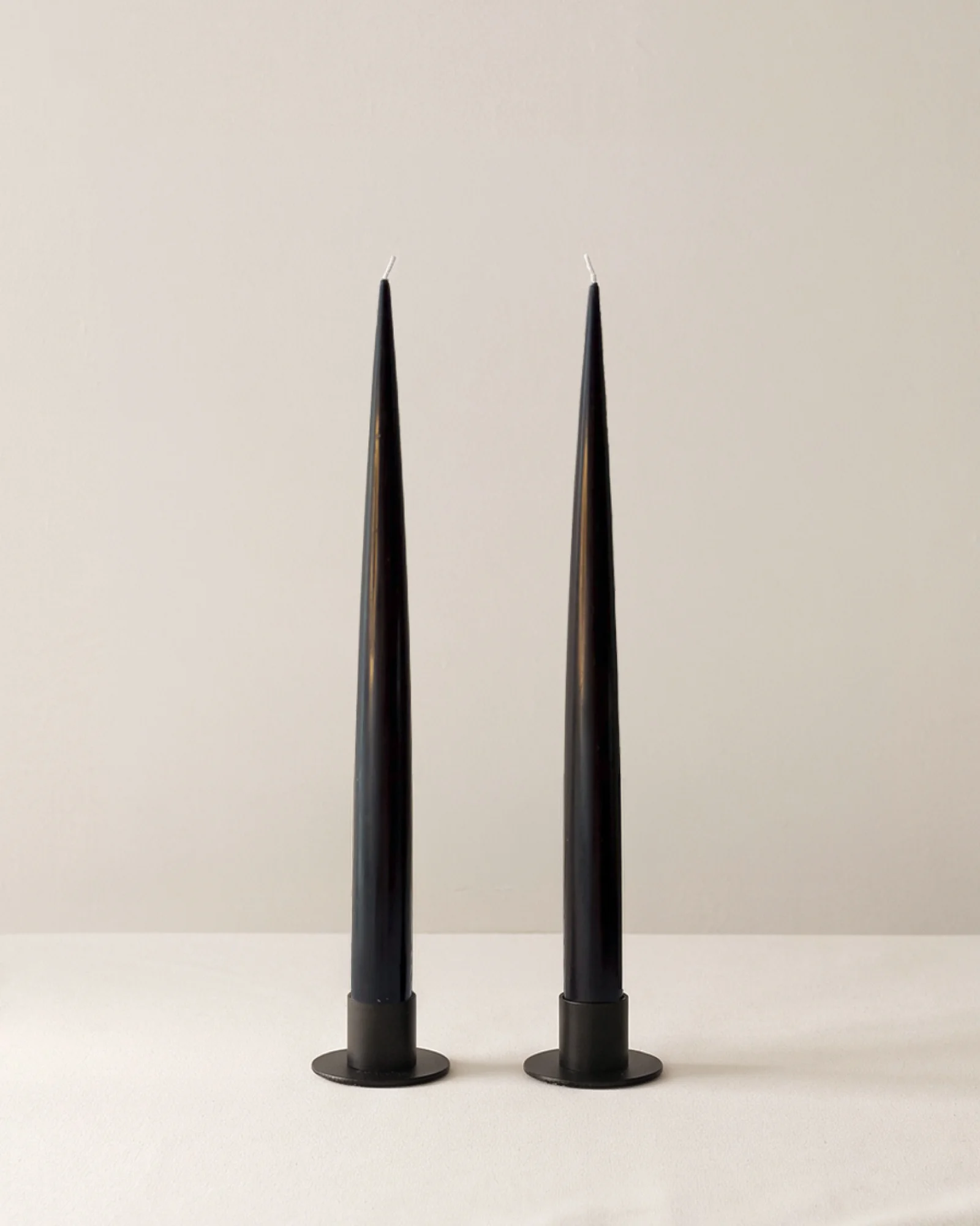 Black candle holder with candles