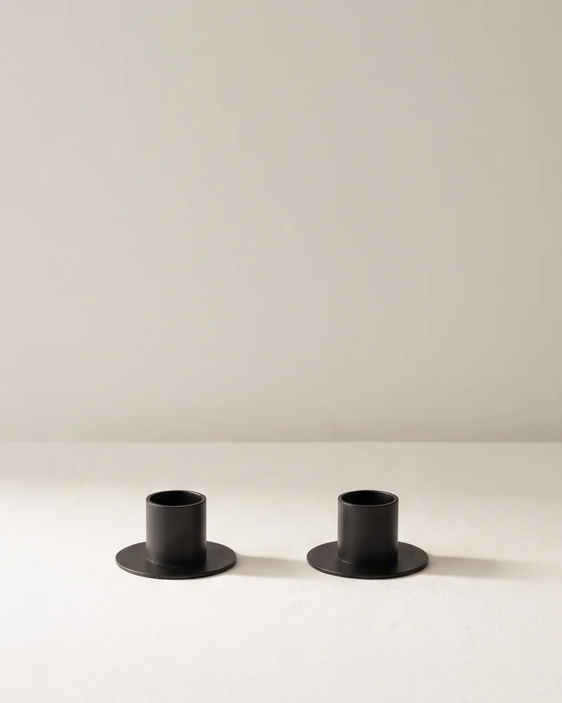 Pair of black Disk Candle Holders with round bases