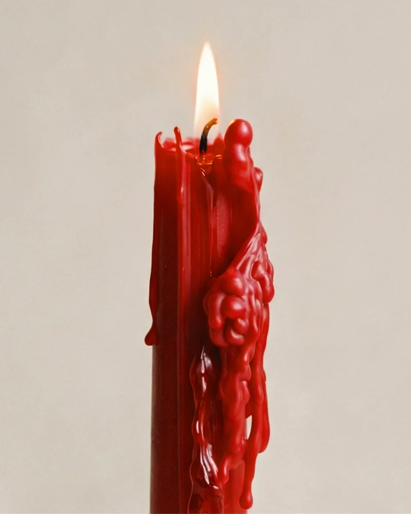 Sculptural candles standing upright with a clean, minimal silhouette.