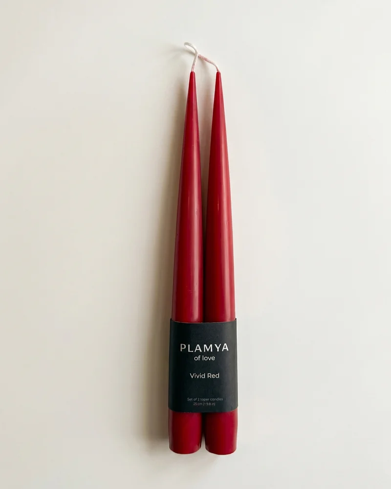 Vivid Red taper candle pair wrapped with a black PLAMYA paper band